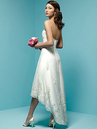 Tea length hi low satin strapless wedding dress is elaborately covered ...